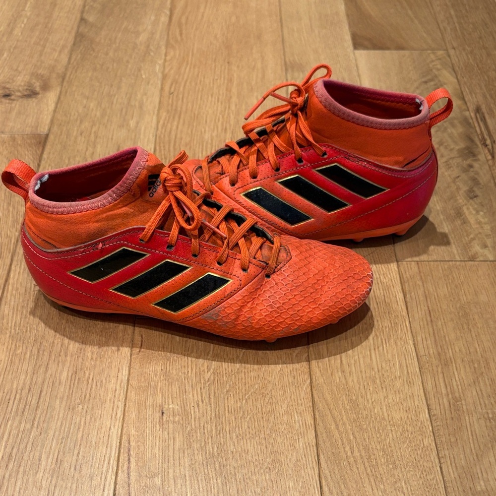 Adidas Orange and Black Soccer Cleats